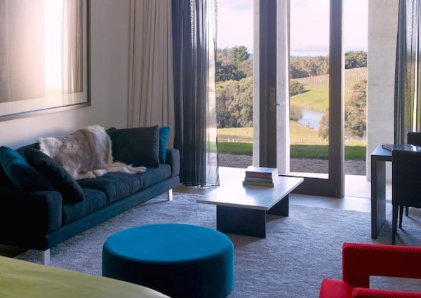 View of loungeroom inside the rooms you can stay in Port Phillip Estate. Lounge looks out onto the vineyards.