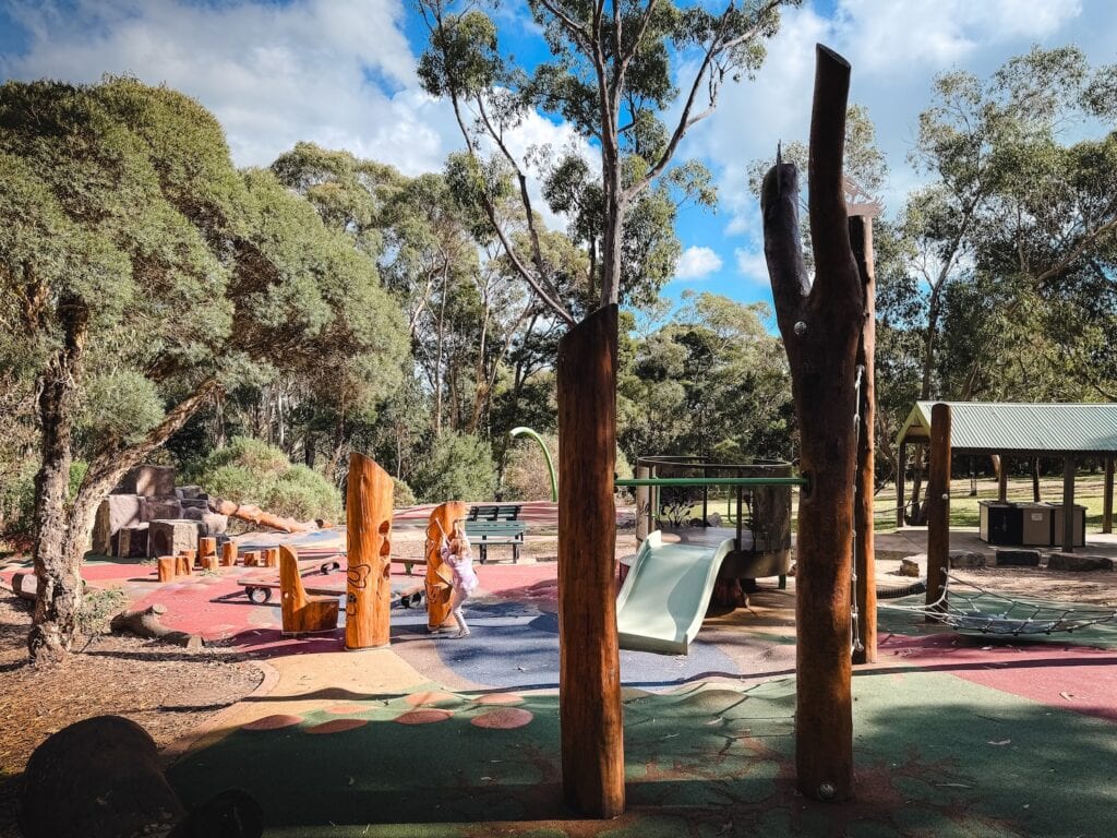 View looking down to Seawinds Gardens playground which is surrounded by gum trees